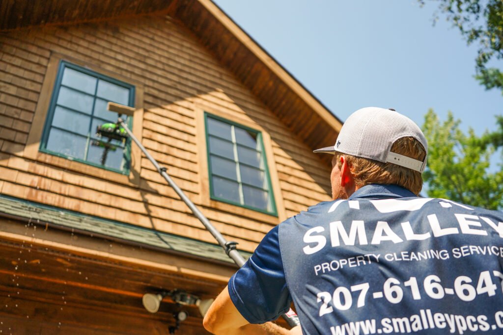 man cleaning window