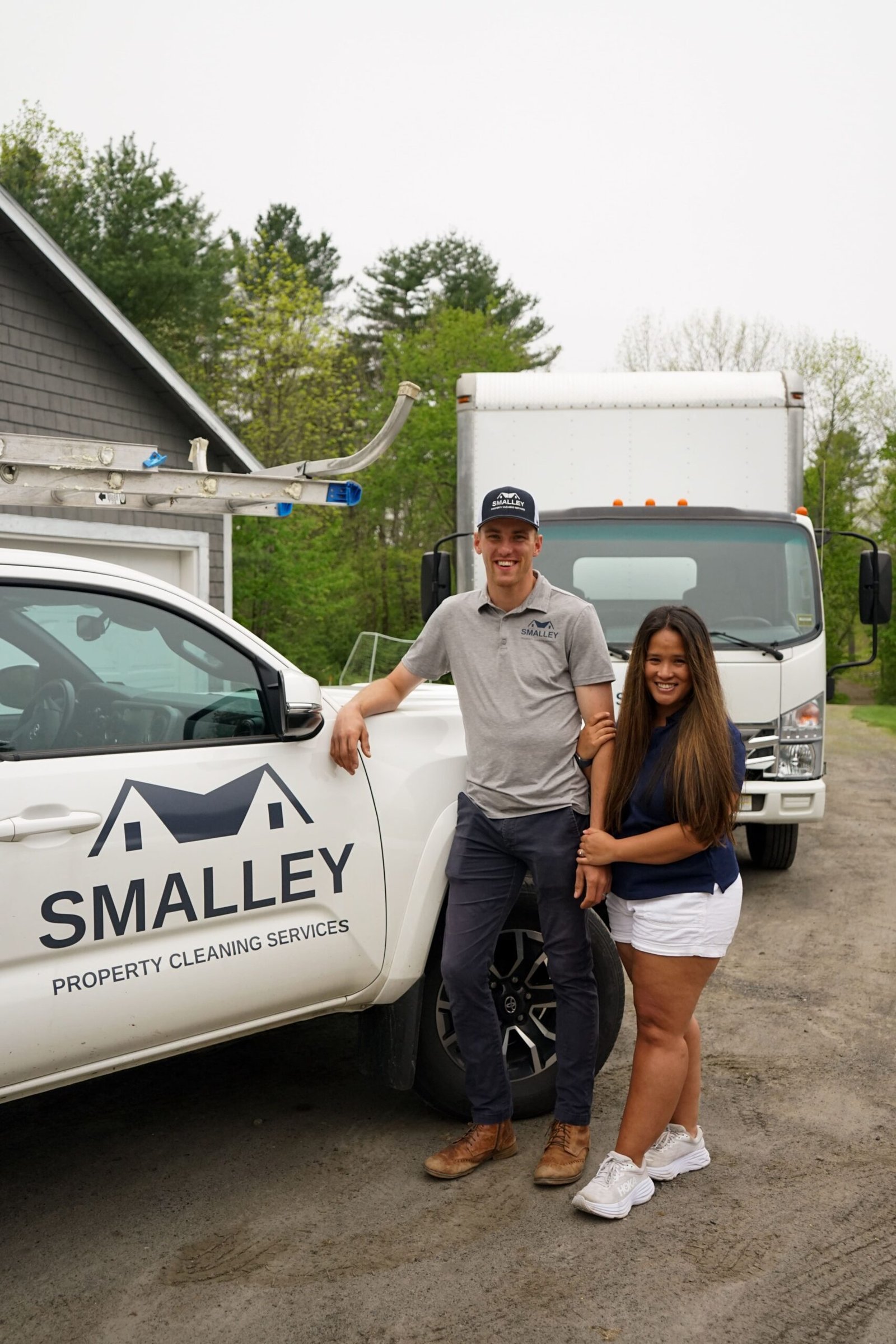 Smalley PCS team standing next to company truck in Sidney, Maine